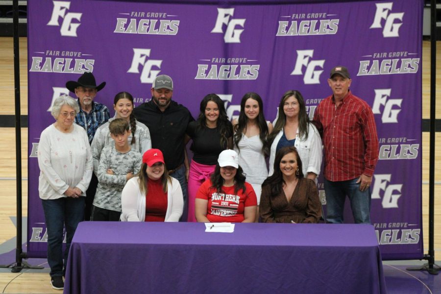 Hannah Morris and her family as she signs to Northern Oklahoma college for livestock judging. (photo taken by Charlie Harp)
