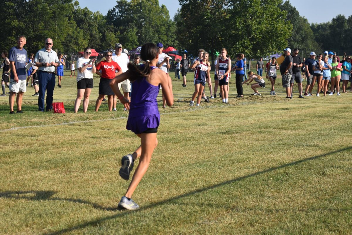 Katrina Cantwell running in her home cross country meet. (Photo by Fair Grove Newspaper Staff)