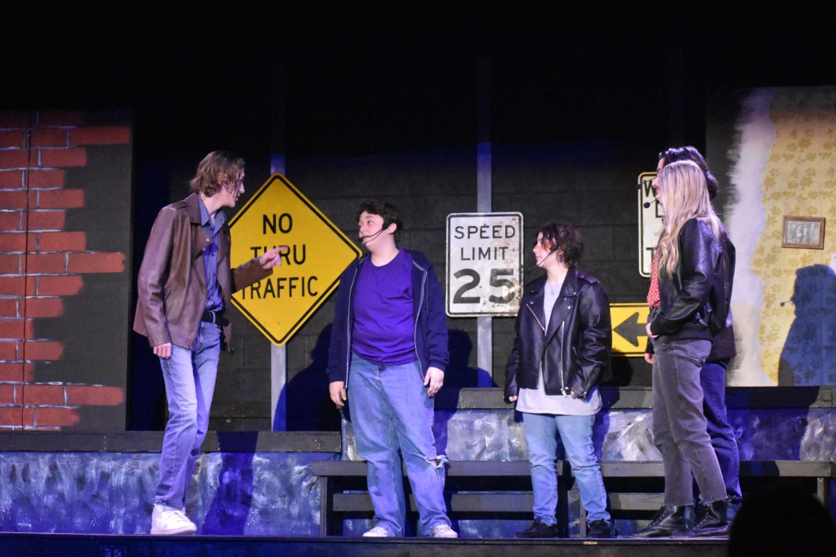 Performance of The Outsiders on 11/2. (From left to right: Collin Shea (10), Nico Jenkins (12), Cheyenne Todd (9), Aaron Faucett (12) and Anna Moffis (10).