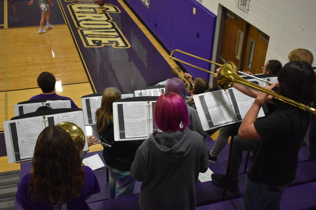 The Pep Band playing at the girls basketball home game. 