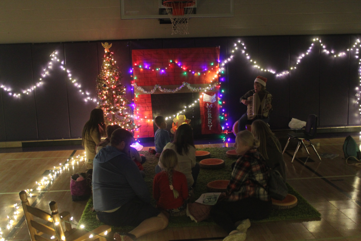 Kim Boatwright sings Christmas songs during the Winter Family Fun Night.