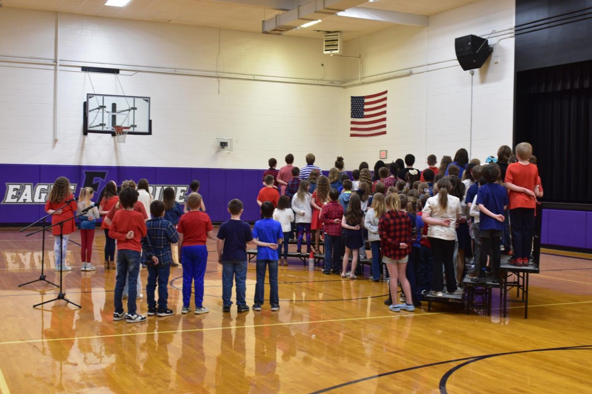 Fourth+graders+singing+the+national+anthem+in+the+2024+fourth+grade+music+program.
