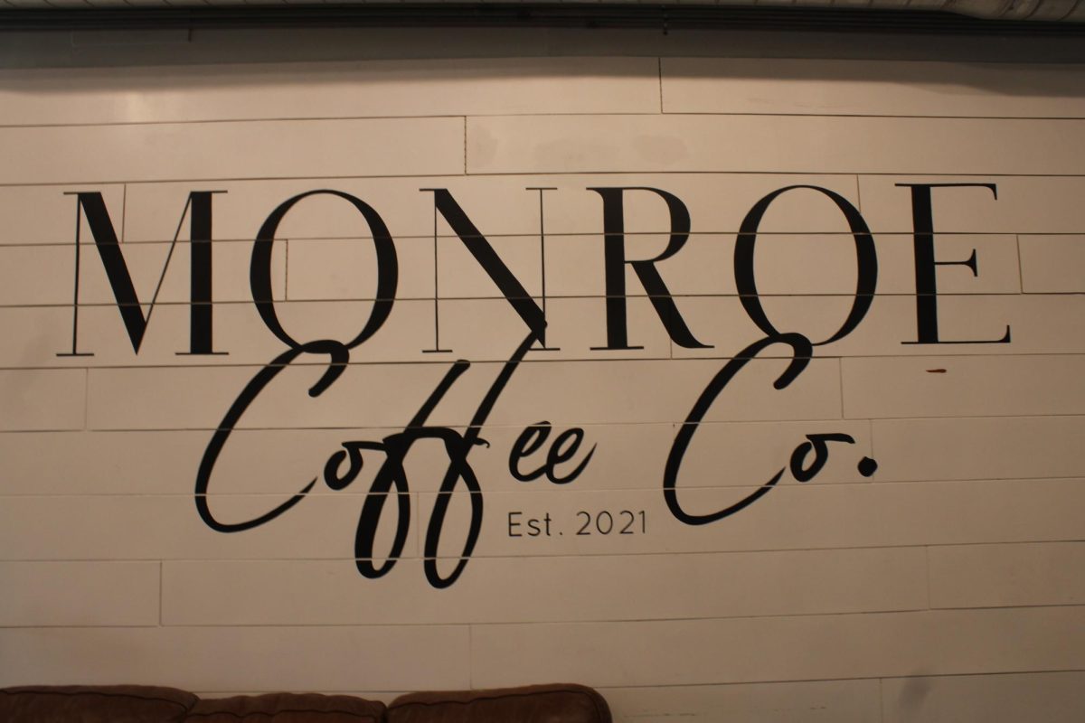 Monroe+Coffee+Shop+logo+on+the+wall+inside+the+establishment