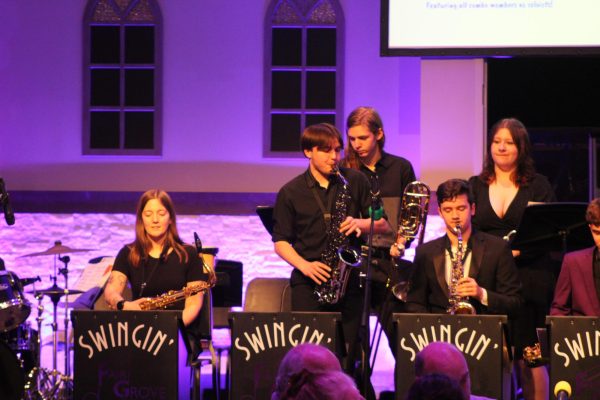 Ayden Teaster playing his solo at the Evening of Jazz. (From left): Director Natalie Palomo, Ayden Teaster, Lee Van Cleave, Collin Emery, Mackenzie Cavin