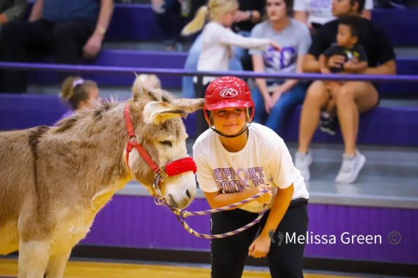 Lindy Sutherland (12) gets ready to play Donkey Basketball at a Project Graduation fundraiser