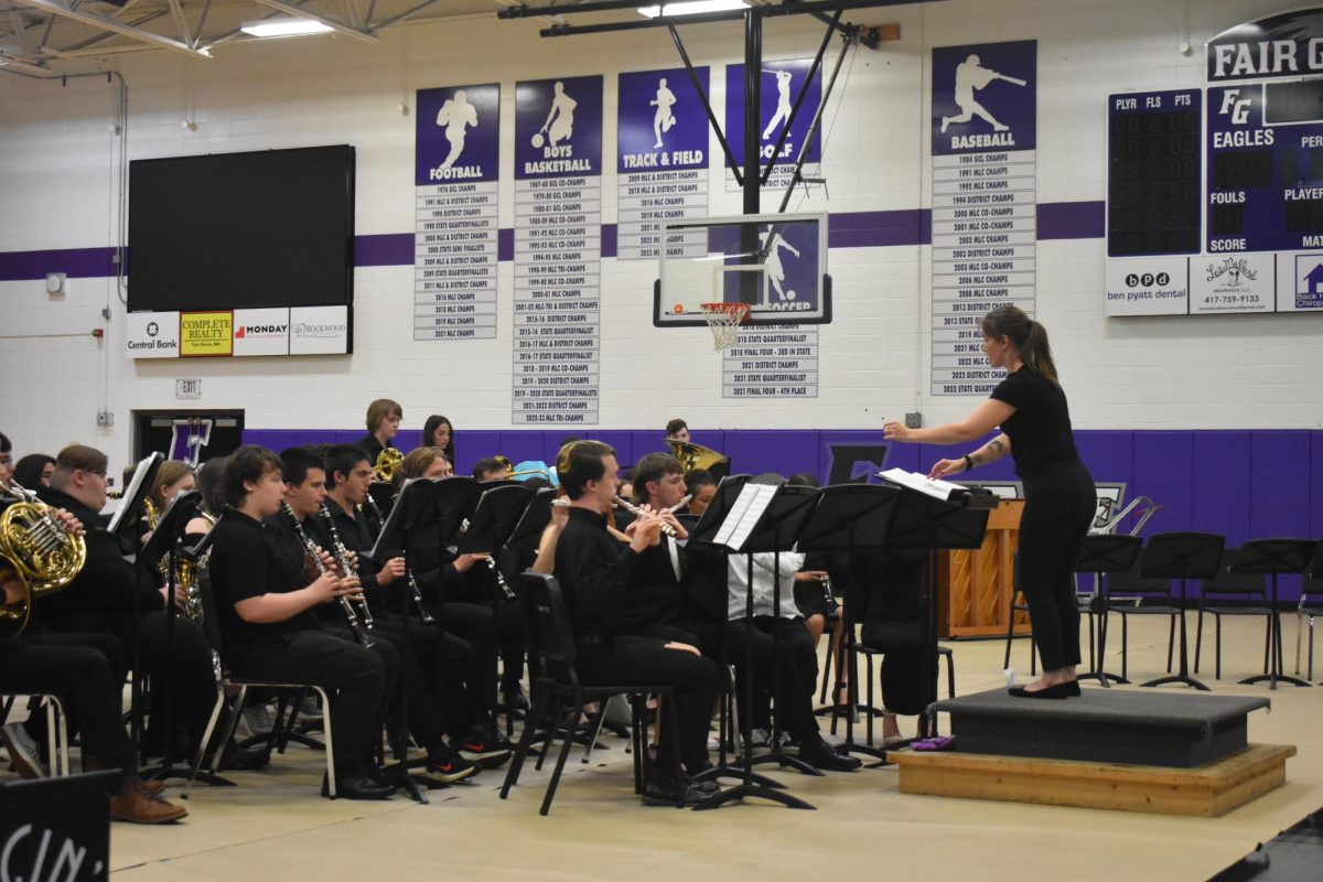 Mrs.Palomo directing the Fair Grove High School Band during their spring concert.