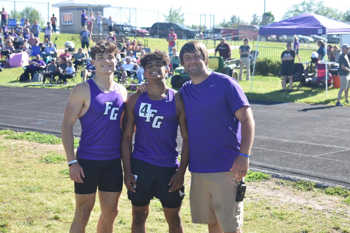 Canyon Crowley (11), Kellen Lair (11) and Michael Zanzie at a home track meet.