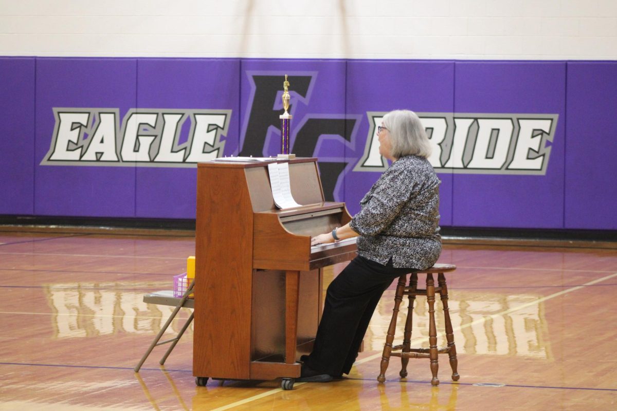Cindy Sparks playing piano at the Singing Eagles spring concert. 