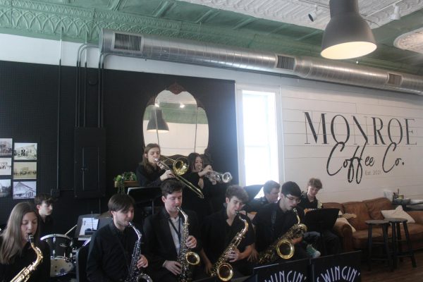 Jazz band performing at Monroe Coffee Co. (from left to right) Natalie Palomo, Brandon Kandlbinder (12), Ayden Teaster (12), Collin Emery (11), Lee VanCleave (10), Mackenzie Cavin (12), Wyatt Barber (9), Waylon Wright (10), Keith Nolan (10), Gavin Brock (10)