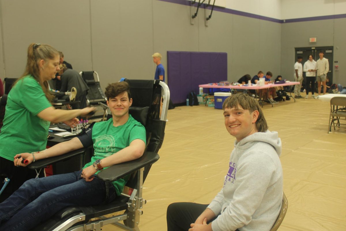 From left: Juniors Lucas Engel giving blood and Carson Krider as a Bed Comforter