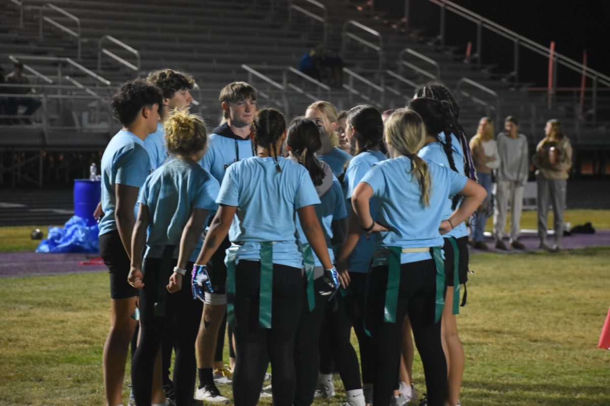 Carson Krider, the Surfers coach huddling up his team at the Powderpuff game on October 16th, 2024. 