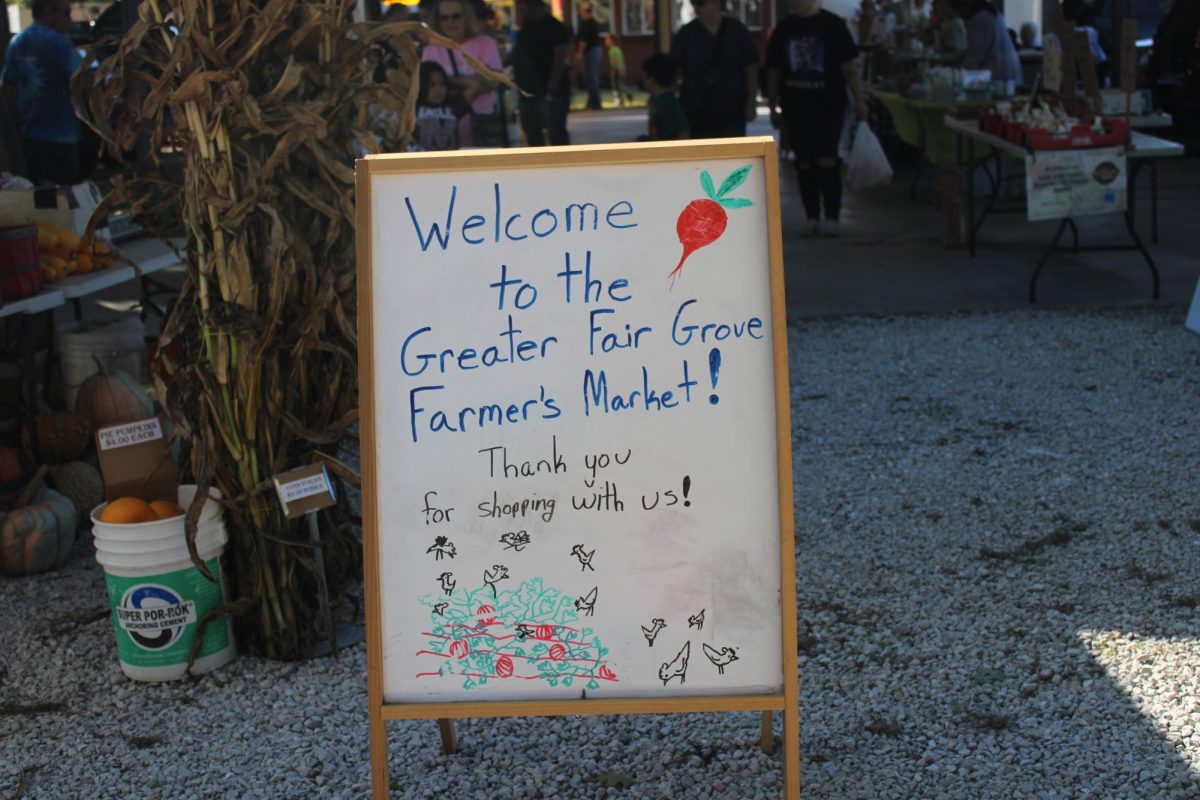 The welcoming sign for Fair Groves Farmers Market 2023-2024