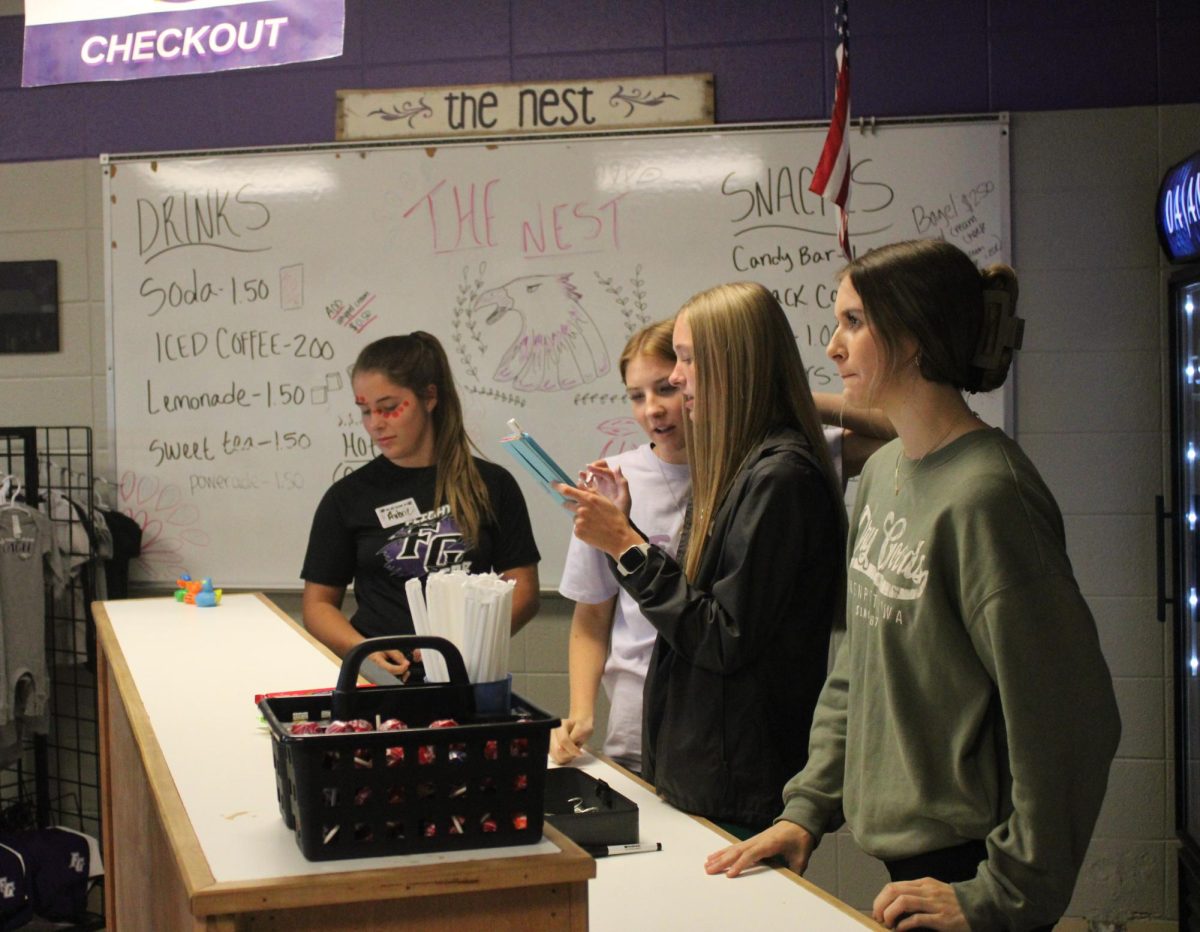 Students serving at The Eagles Nest. 
Left to Right: Willow Buescher, Kara Padgett, Emma Padgett