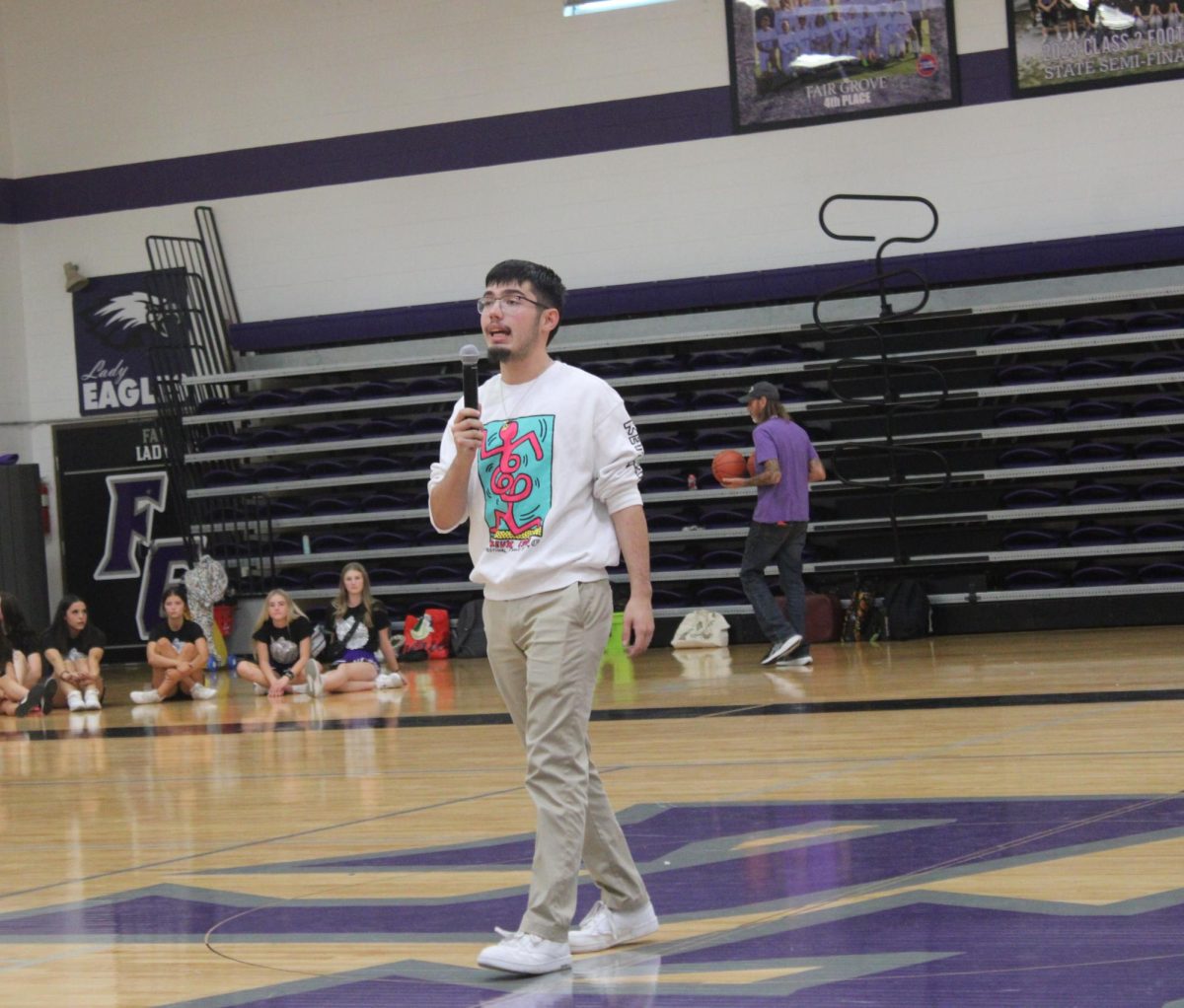 Fair Grove High School Student Body President Keith Nolan announcing the High School Homecoming Assembly