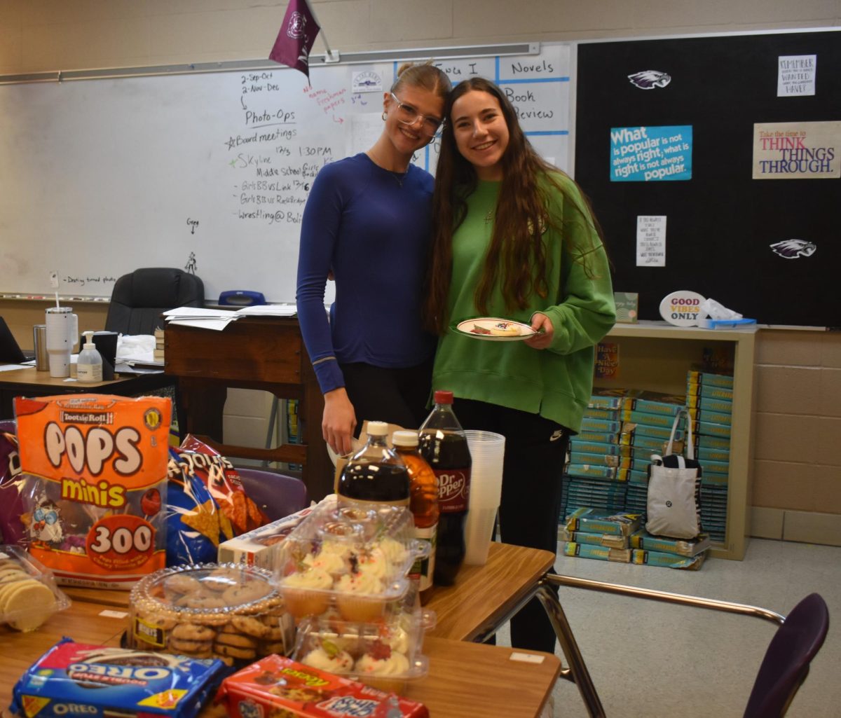 Karlee Marion-Swan (left) and Rebecca Kepes (right) at the Fair Grove High School Newspaper Thanksgiving party. Students were encouraged to bring food and drinks to share with their classmates. 