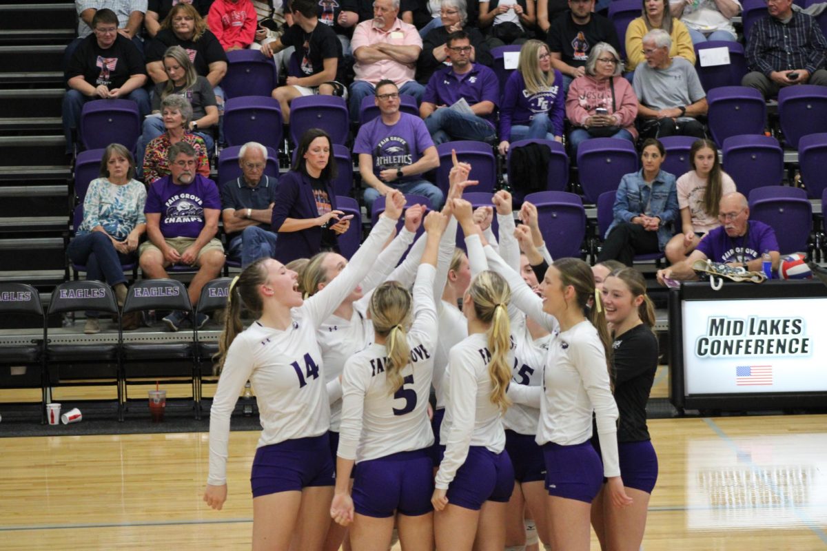 The Fair Grove volleyball team breaks it down to start the senior night game against Dimond High School.