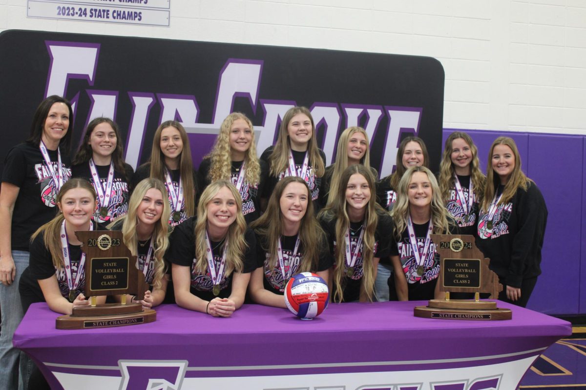  The Fair Grove High School Varsity Volleyball team at their congratulations assembly on November 13, 2024. 
Top Row: Coach Tonya Peck, Shayla Haddock (11), Leila Huff (11), Sofee Garrett (11), Kynlee Peck (10), Hali Stokes ( 11), Addyson Nunley (11), Kenna Fishback (11), Assistant Coach Dani Kepler
Bottom Row: Emaley Stallings (12),  Ashton Bell (12), Shea Skouby (12), Abbey Green (12), Greta Arnett (12), Brooke Daniels (12)