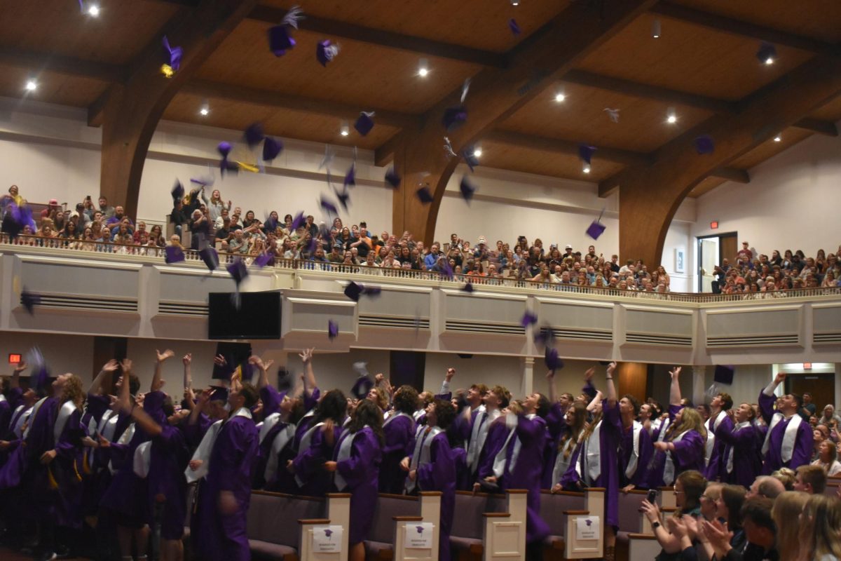 Fair Grove High School 2024 Graduates throwing their caps in the air after graduation. Though freshman and seniors are going through differences with either their first or last year of high school, they are all working towards the same goal in the end.