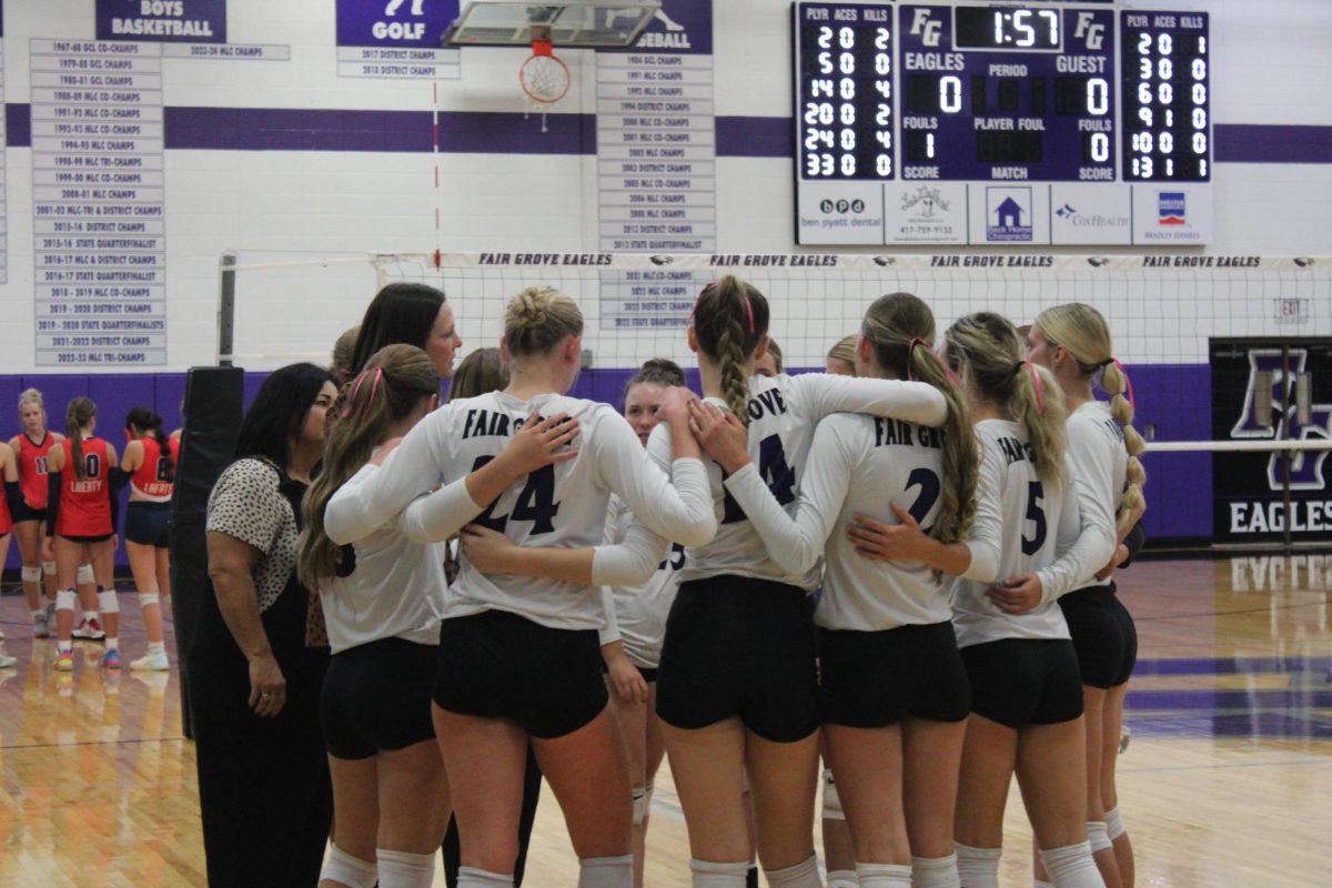 Fair Grove volleyball team in a huddle in their game against Mountain View-Liberty on September 16th at home.