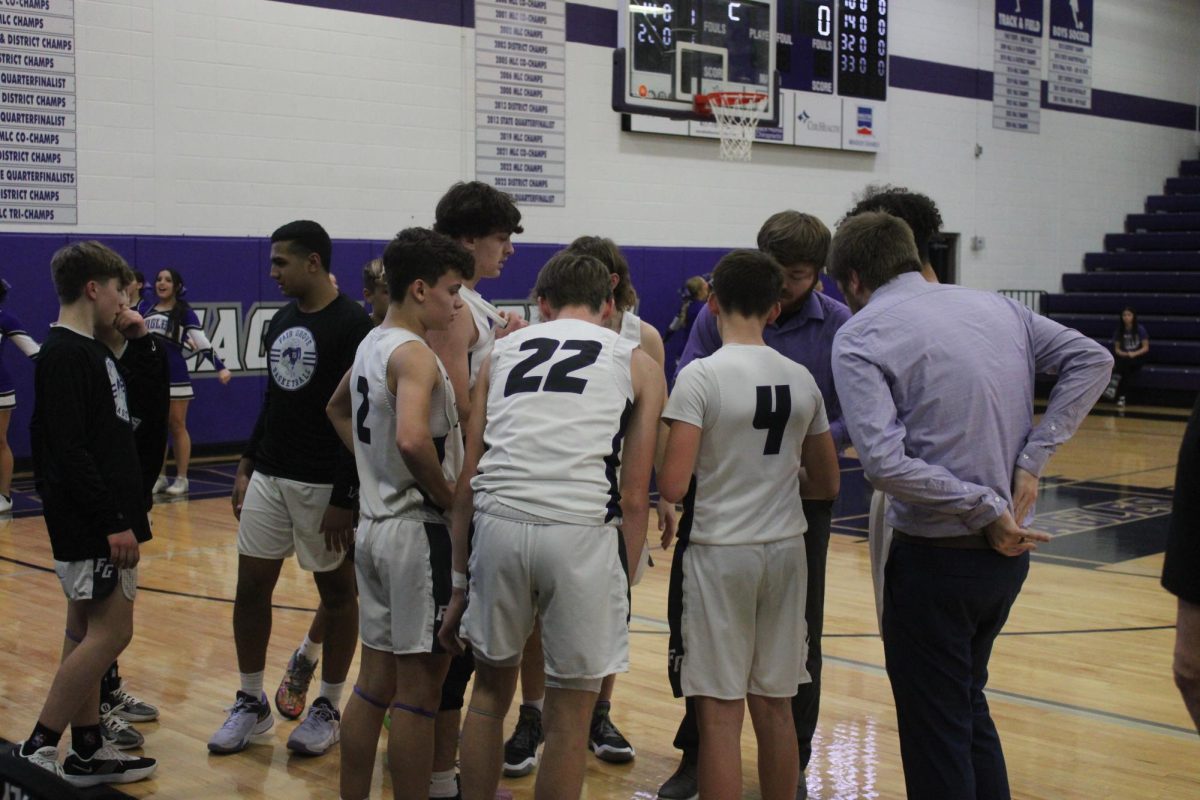 The Fair Grove Junior Varsity Boys Basketball Team huddling up during a time out in their game against Mount Vernon High School on January 17th, 2025.