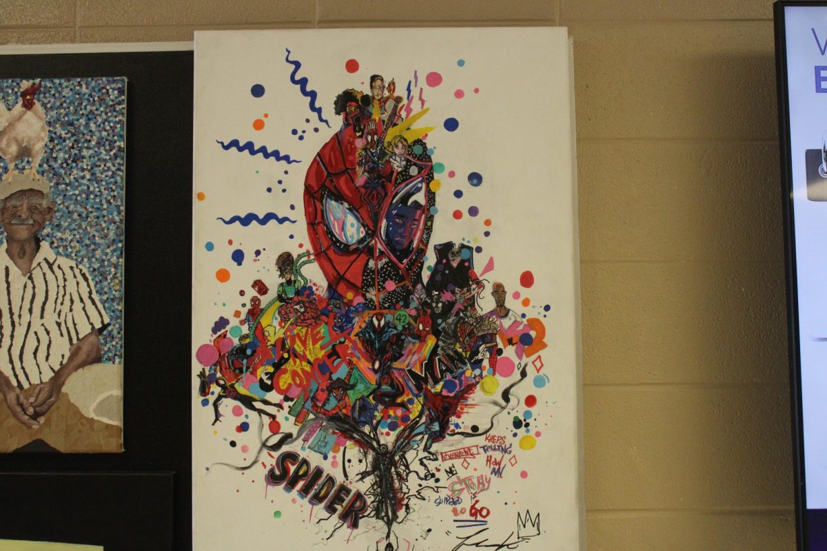 Zachery Hessing's artwork, hanging in the hallway by the high school art room.