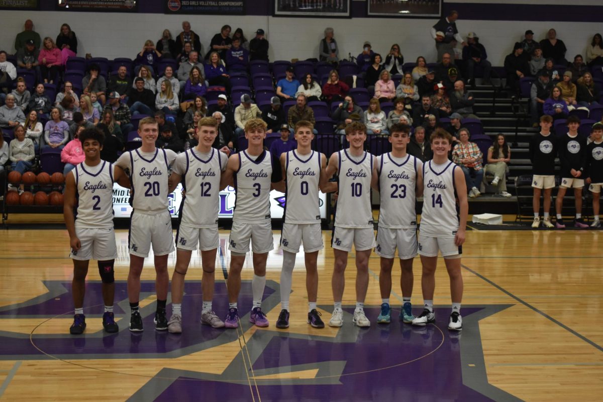 The 2024-2025 boys basketball seniors at their senior night on 2/17. Left to right: Kellen Lair, Atticus Brandes, Kellen Kirkpatrick, Spensar Seiger, Samuel Kennard, Kyle Winterberg, Bryden Baxter, and Brock Boatwright.