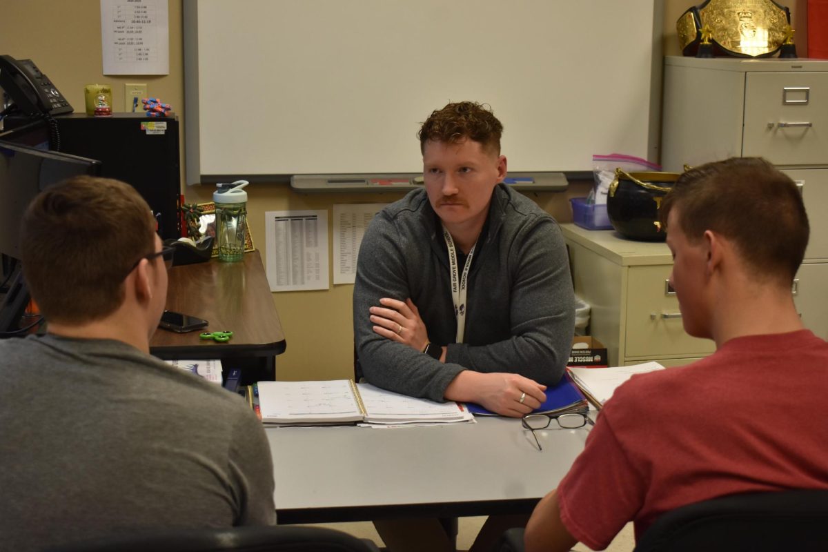 ISS and Alternative School Instructor, Brian Neumann, teaching his students in the ISS room.