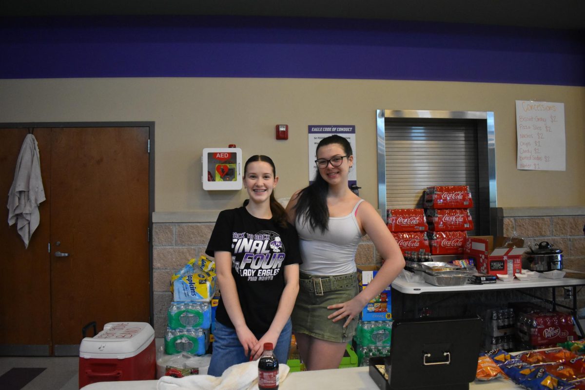 Choir students Lacie Workman (9) and Lola Dolan (9) working concessions at the Fair Grove Music Fest.