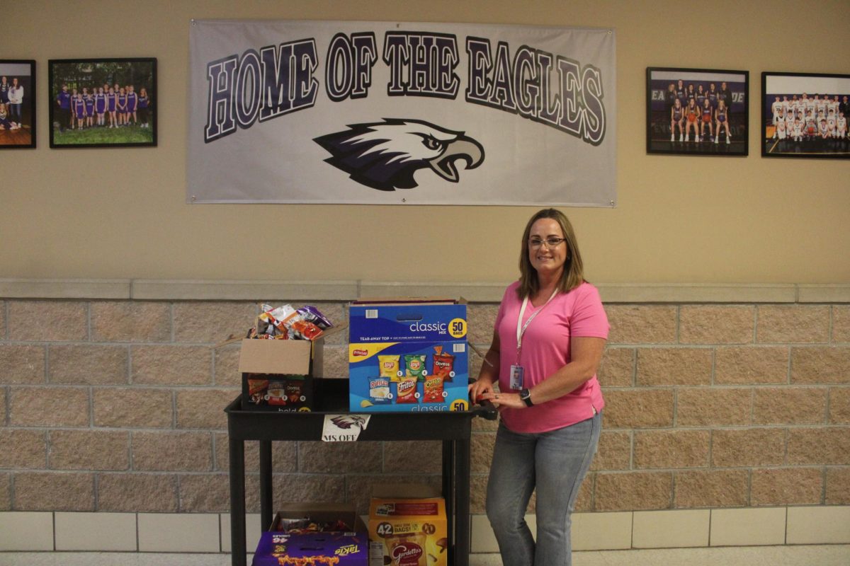 Kristie Lepold handing out snacks for the MAP Testing students.