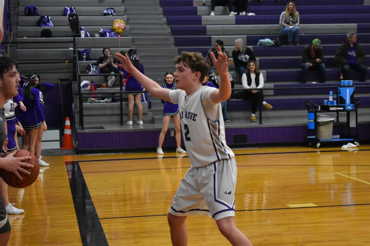 Current freshman, Jacob Ahnen, playing defense against Reeds Spring during his eighth grade basketball season in 2025.