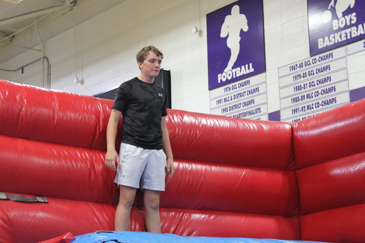 Freshman Jacob Ahnen going through the wipeout bounce house at SADD's most recent event, the SADD kick off. This event was on Friday, August 29th, 2025 