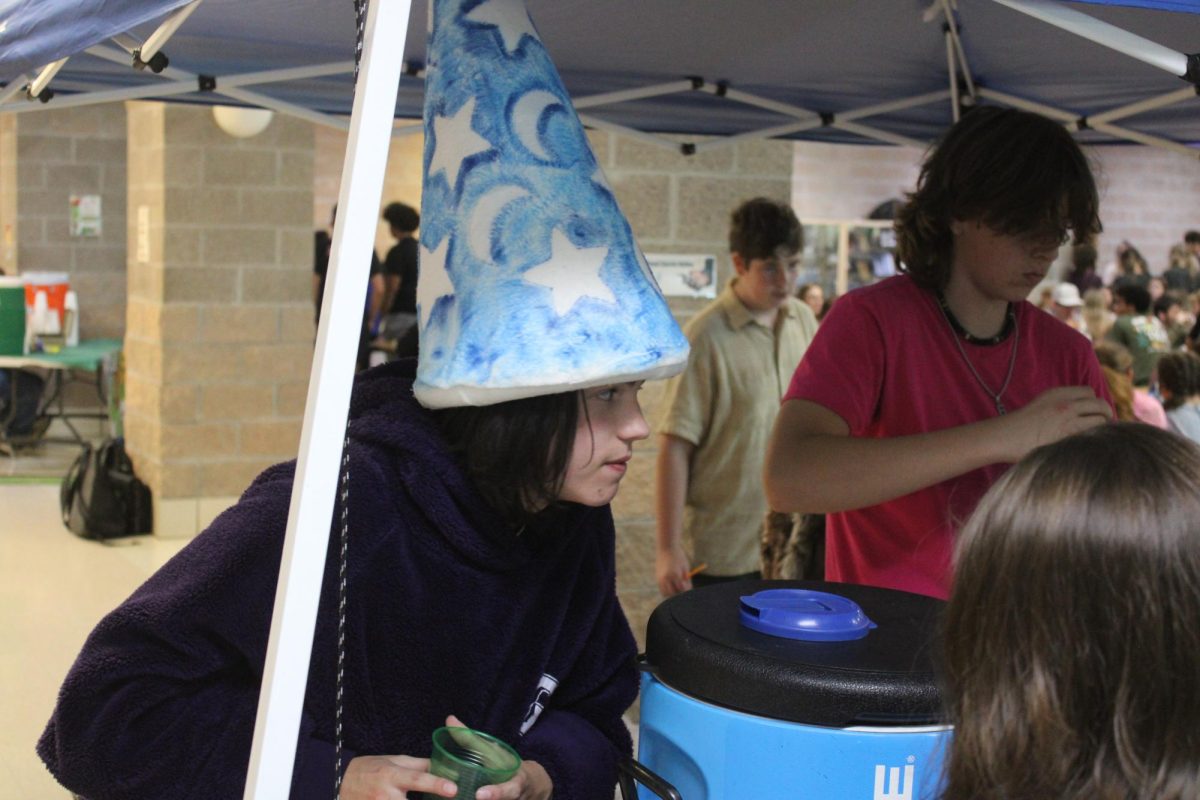 Zachire McCoy (10) played the role of Magical Merlin at his lemonade stand, Merlin's Magical Mix, on October 2nd, 2025. His lemonade offered lemonade with the Monster Energy Drink added. 