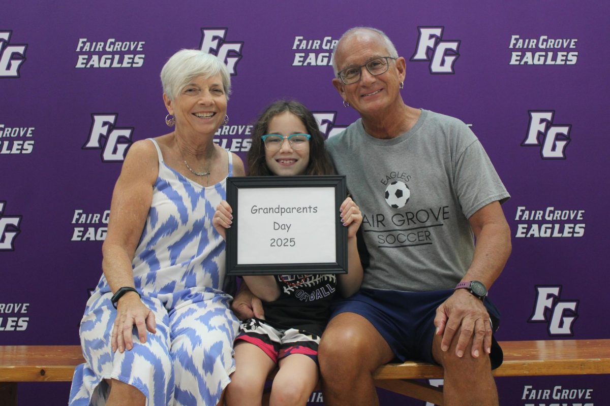 At Grandparents Day, Project Grad and Fair Grove News partnered to take pictures for everyone that attended Grandparents Day. 
From left to right: Debbie Florez, Briar Florez (3), and Bob Florez