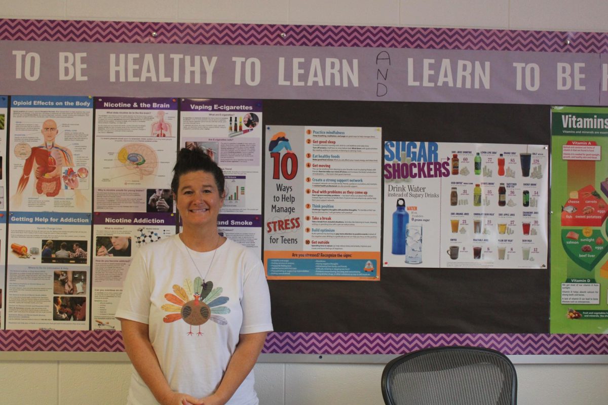 April Davis assists both district nurses throughout the day, helping with everyday tasks. The nurse's aide position is new to the district, as of this year, making Davis the first one to step into the role at Fair Grove.