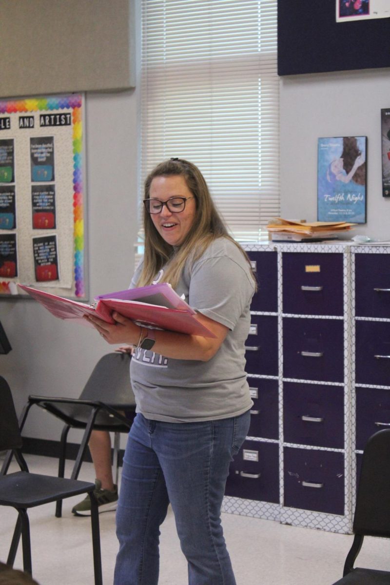 Audra Harmon, the Singing Eagles Director sings along with her students and guides them with her voice. The choir practices the chorus all in sync with Harmon. As of now, they are preparing for the Veterans Assembly on November 11, 2025.