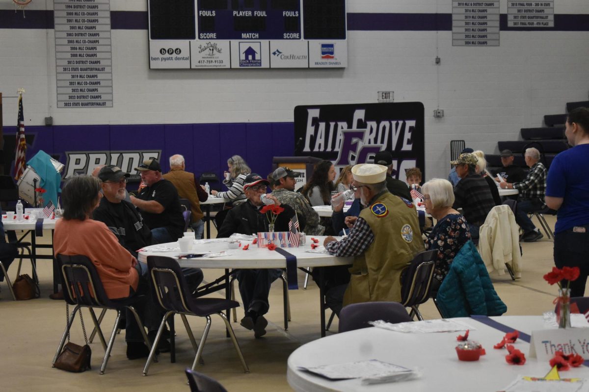 Local veterans gather for a warm breakfast in the Fair Grove High School gym before the 2024 Veterans Day assembly, visiting with one another as they prepare for the morning's speeches and musical tributes.