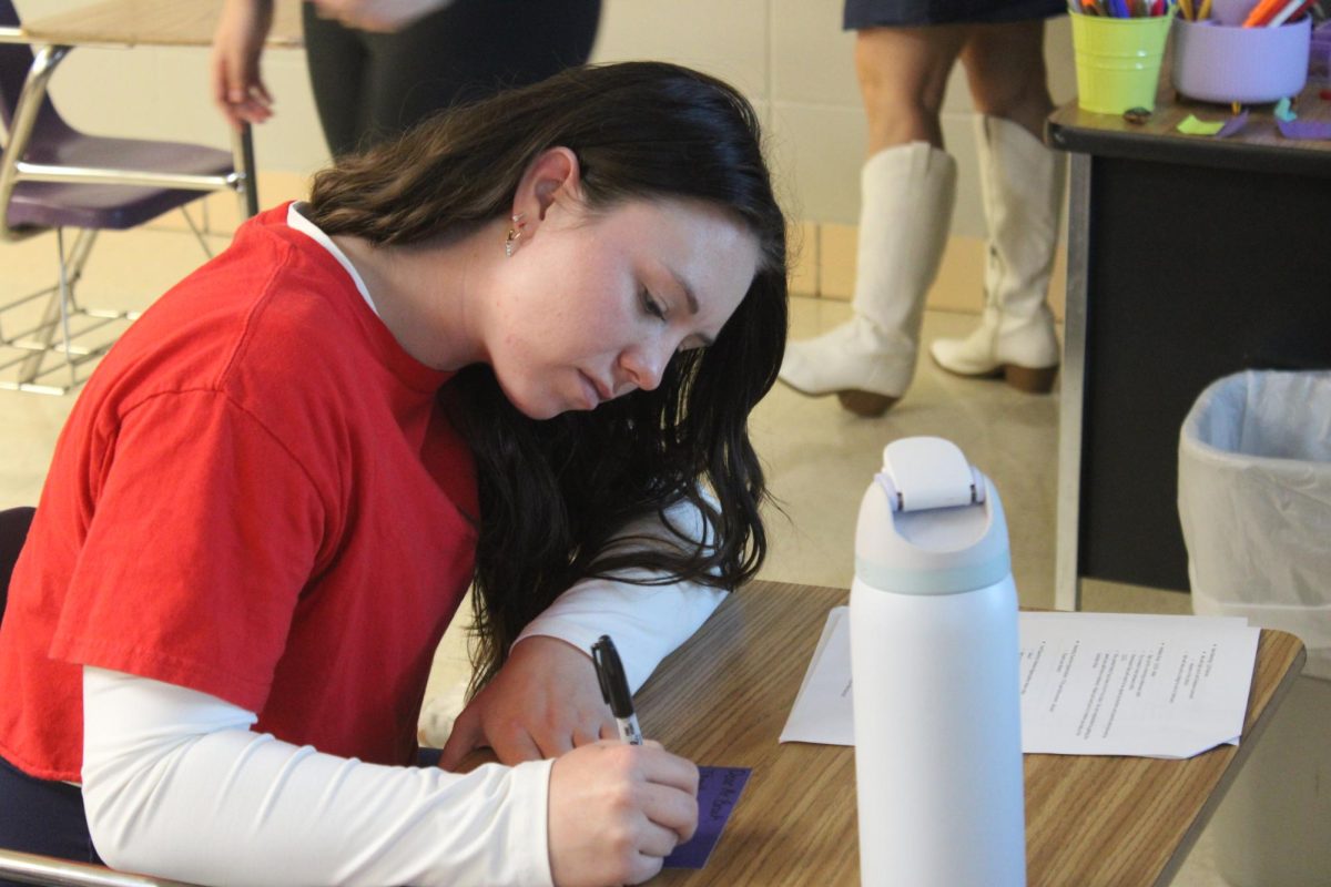 Addyson Nunley (12) going over the plans for Future Teachers of America. FTA holds a meeting every second Tuesday of the month.