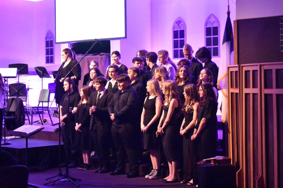 Audra Harmom conducting the Fair Grove High School Choir at the 2025 Evening of Jazz event. Evening of Jazz is an event that is presented by the Fair Grove High School Choir and Jazz Band.
