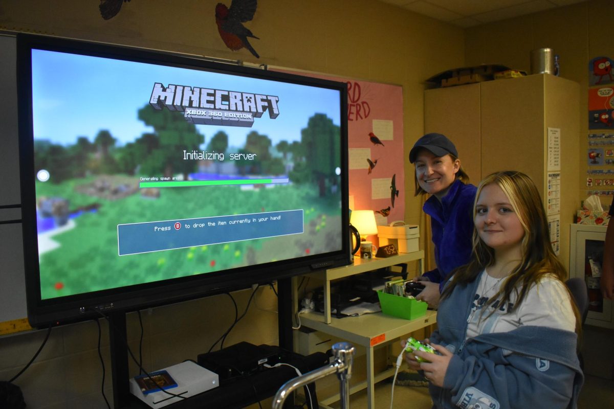 Sarah Englis, the Fair Grove Anatomy and Investigative and Animal Biology teacher playing Minecraft with student McKendal Gentry (11) at the 12/17 Nerd Club meeting. Nerd Club is available every third Wednesday of the month in the Fair Grove advisory period.  