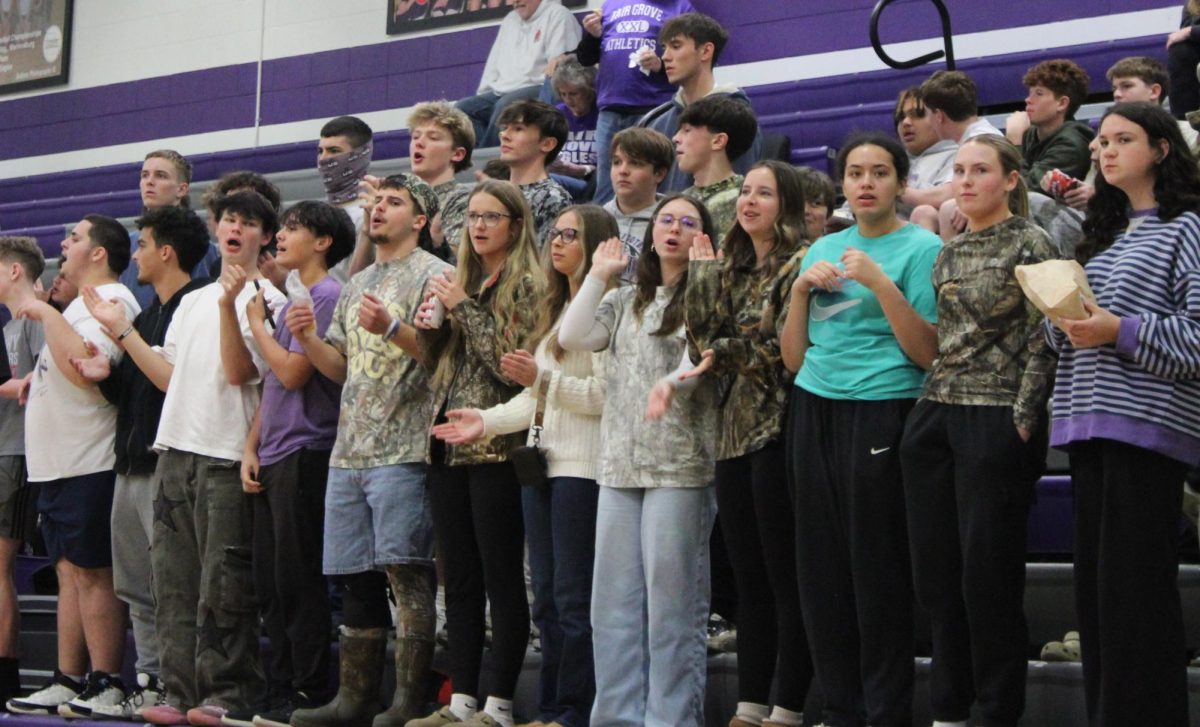 The Fair Grove High School pep club cheering at the girls basketball game on December 11, 2025. The game resulted in a loss to Skyline with a score of 27-54.
Starting from the top row from left to right, Wes Hart(12), Gavin Letterman(9), Grey Pritchett(9), Jaiden Hicks(9). Second row Ty Hart(9), Riley Bowse(11), Carson Trussell(12), Macklen Johnson(12), Anderson Teaster(10), Christian Wilson(10), Third Row Eli Line(9), Jack Christiano(11), Wyatt Anderson(10), Mosiah Talua(9),Dylan George(12), Brenna Boatwright(12), Eva (12), Addyson Nunley(12), Kenna Fishback(12), Aislynn Starks(12), Anika Nyberg(10), Palin Lentz(10).