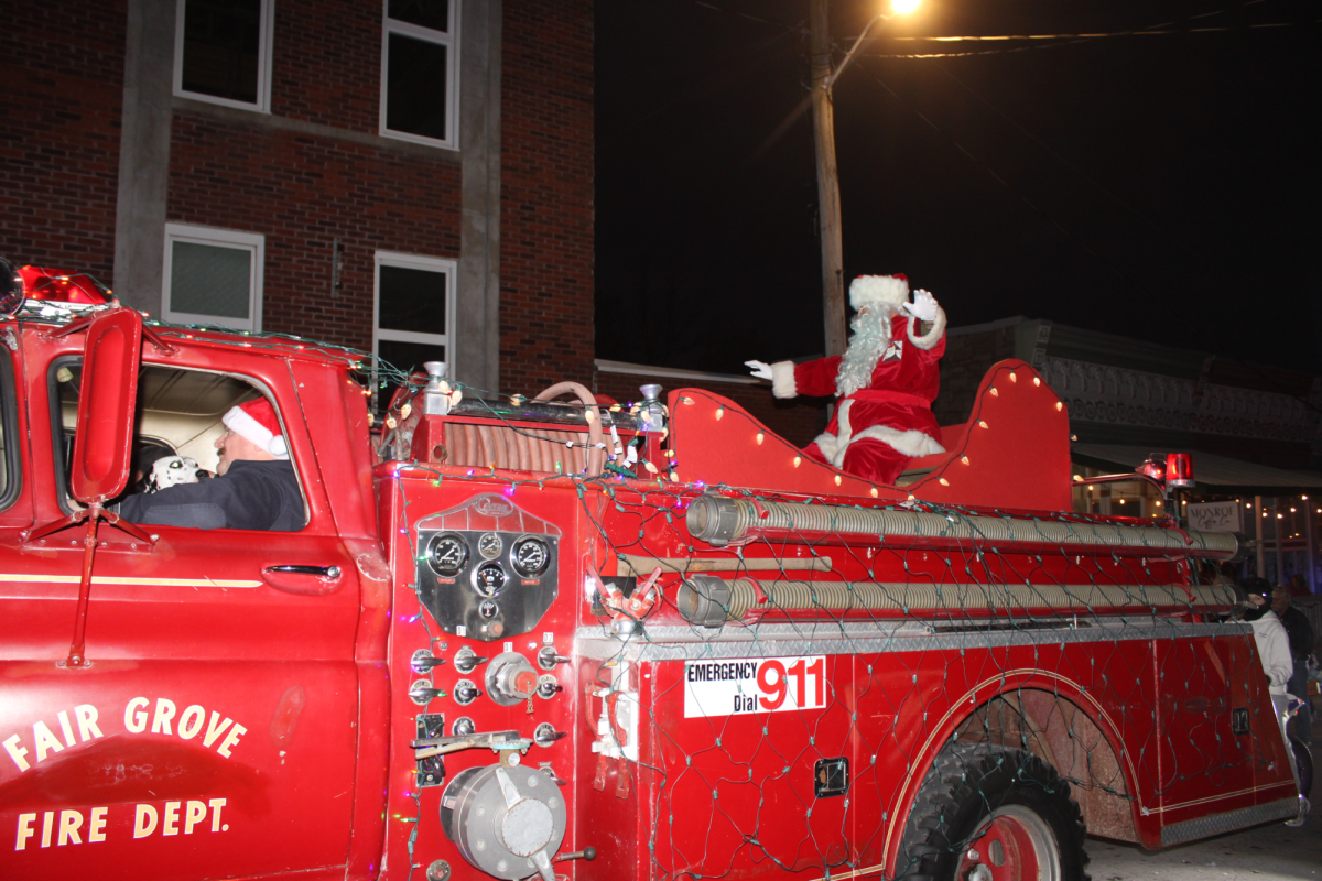 Santa sitting on a Fair Grove fire truck riding through the Christmas parade. The Christmas parade was on December 6th and went from the High School to the top of the hill. 