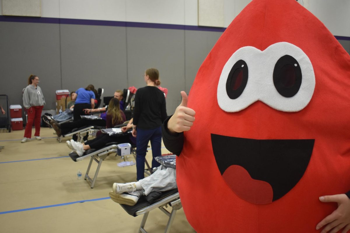 The NHS blood drive mascot giving a thumbs up as volunteers donate blood. The blood drive took place on December 12th 2025. Photo taken by Jesse Elliston
