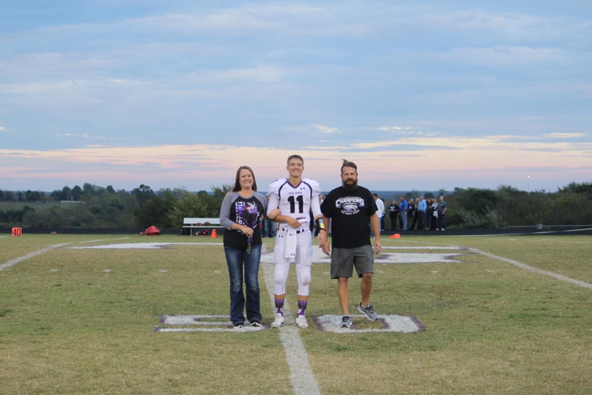 Jayden Kensinger in his senior year in 2018, walking down the field during his senior night. He will be a new history teacher for the 2026-27 school year.
