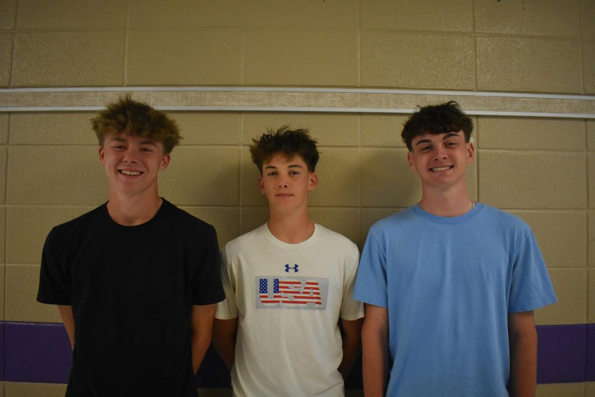 Senior Grant Fuller and Juniors Blake Baxter and Finn Harp get ready for the 2026 golf season. 