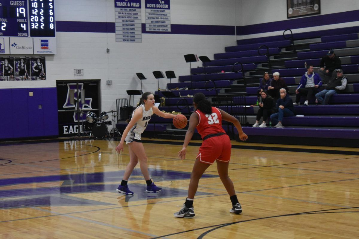 Senior Rebecca Kepes sets up the play at the top of the key, helping the Fair Grove girl's basketball team to a win against Reeds Spring on 2/10/2025. 