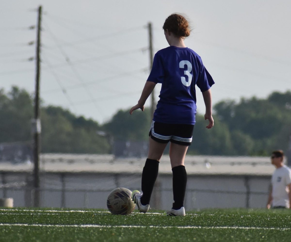 Addison Miller (8) setting up for kick off. Kick off is set piece to restart the play after a goal. 