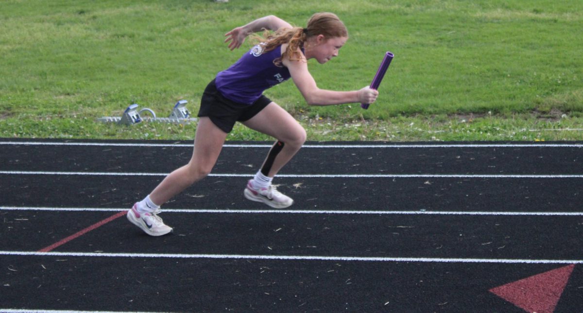 Middle School track athlete Addison Miller (8) running her event during the 2024-2025 track season her seventh grade year.