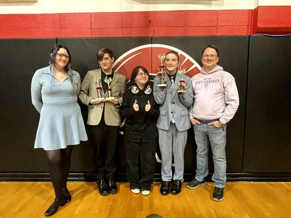 Members of the Fair Grove High School Speech and Debate team after the award ceremony at New Covenant Academy. Members from left to right: Mackenzie Jenkins (12), Preston Hicks (12), Alyssa Wade (12), Colton Hicks (12), and Fair Grove High School Theater and Speech and Debate Coach Leroy Barker.
