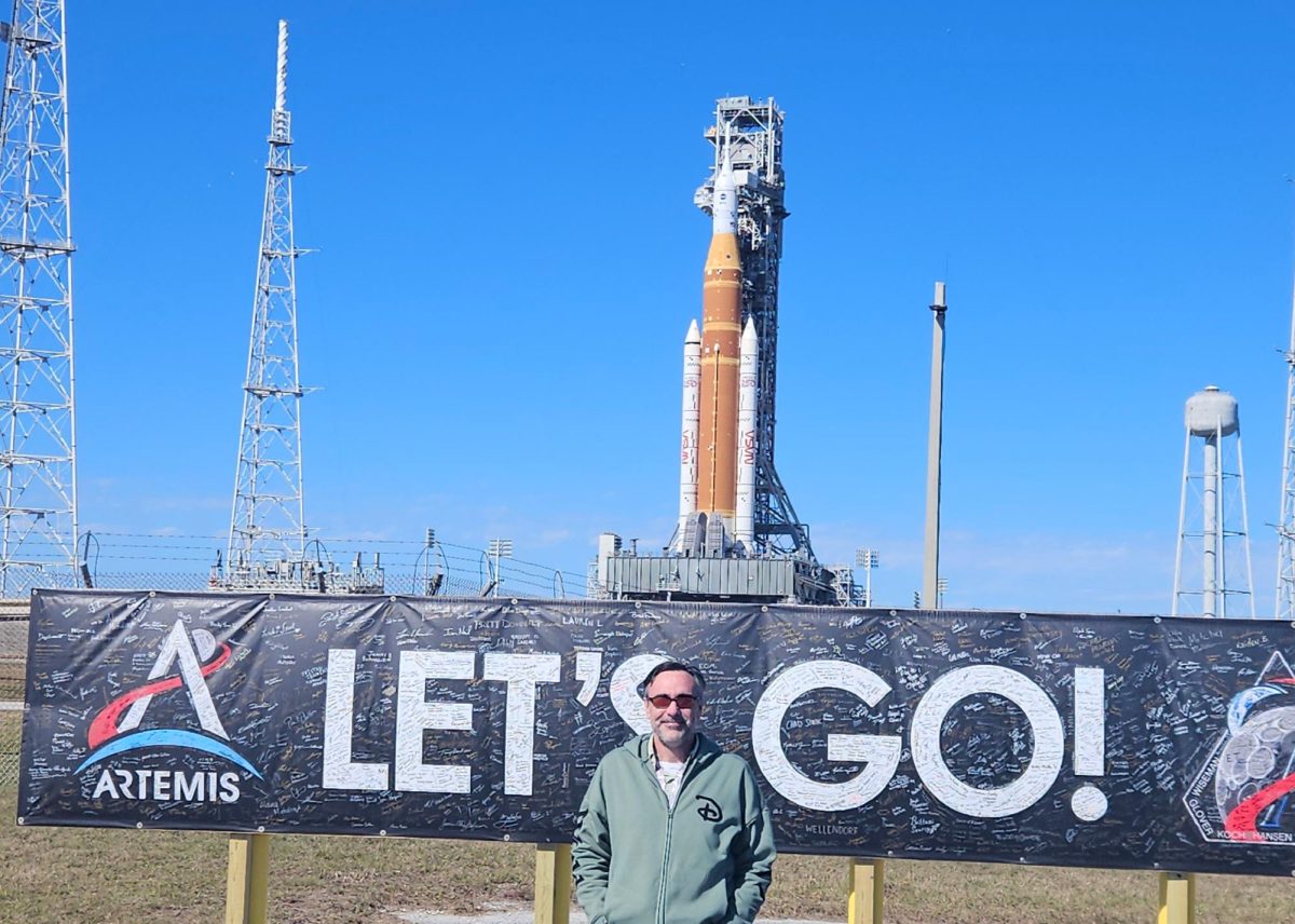Darin Zebel with Artemis II right before flight. He worked hard with his team to help build things for the mission.