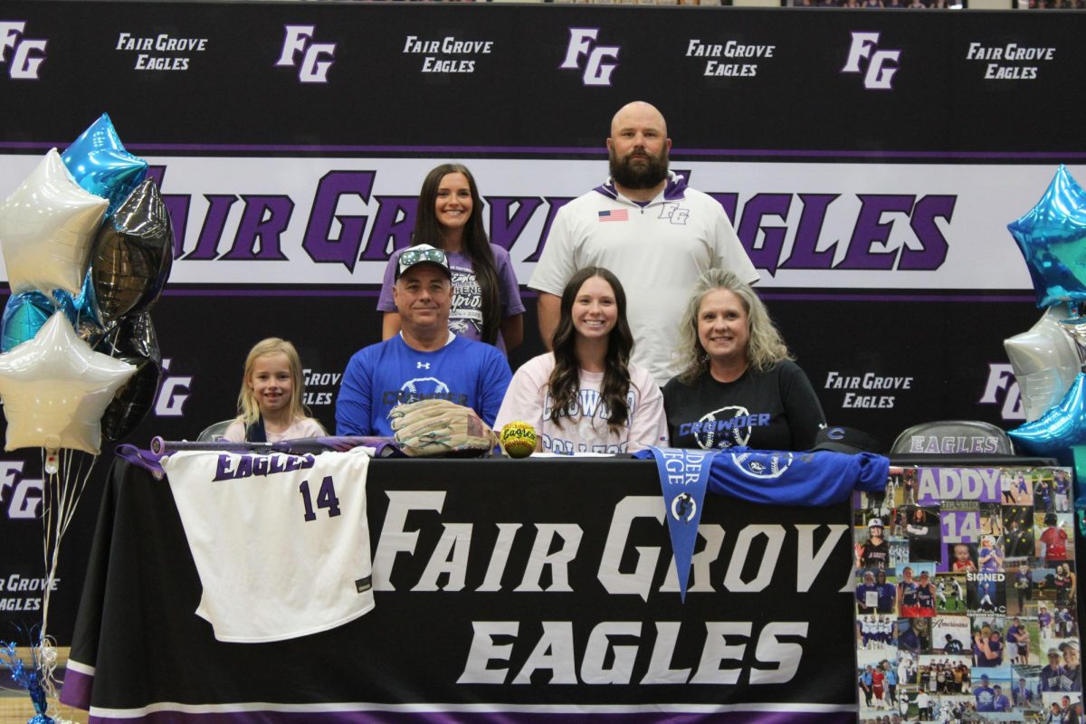 Addyson Nunley (12) signed to Crowder College to continue her softball career. First row, left to right, Shyan Lankford and Bill Voorhis. Second row, Aurora Bradley (1), Jim Nunley, Addyson Nunley, and Stacey Nunley. 
